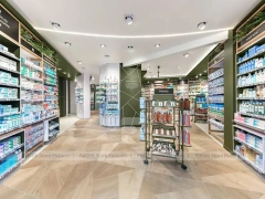 Green Gray Pharmacy Wall Shelving and Checkout Aisles