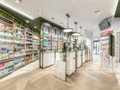 Green Gray Pharmacy Wall Shelving and Checkout Aisles