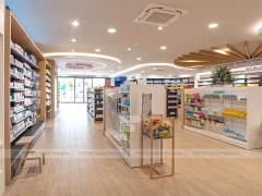 Green Plant Pharmacy Gondola and Wood Wall Shelving