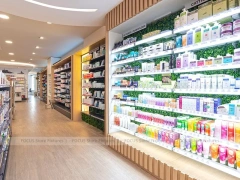 Green Plant Pharmacy Gondola and Wood Wall Shelving