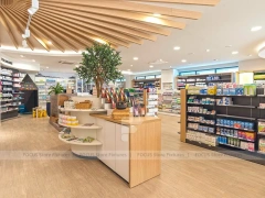 Green Plant Pharmacy Gondola and Wood Wall Shelving