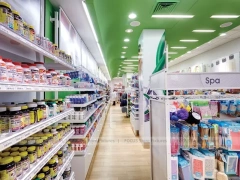 Green Spa Retail Wall Shelving Aisle Display