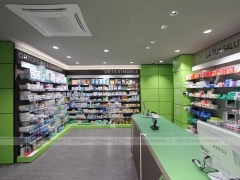Lime Green Pharmacy Counter with Numbered Checkout Desks