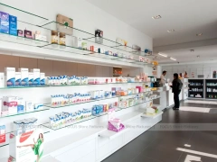 Long Wood Wall Pharmacy Shelving with White Counter