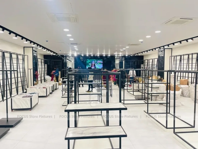 Minimal Black Frame Apparel Store Fixture Layout