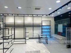 Minimal Black Frame Apparel Store Fixture Layout