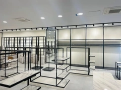 Minimal Black Frame Apparel Store Fixture Layout