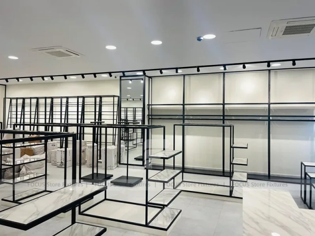 Minimal Black Frame Apparel Store Fixture Layout
