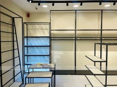 Minimal Black Frame Apparel Store Fixture Layout