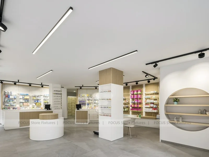 Minimal White Pharmacy Interior with Round Counter