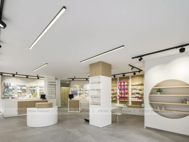 Minimal White Pharmacy Interior with Round Counter
