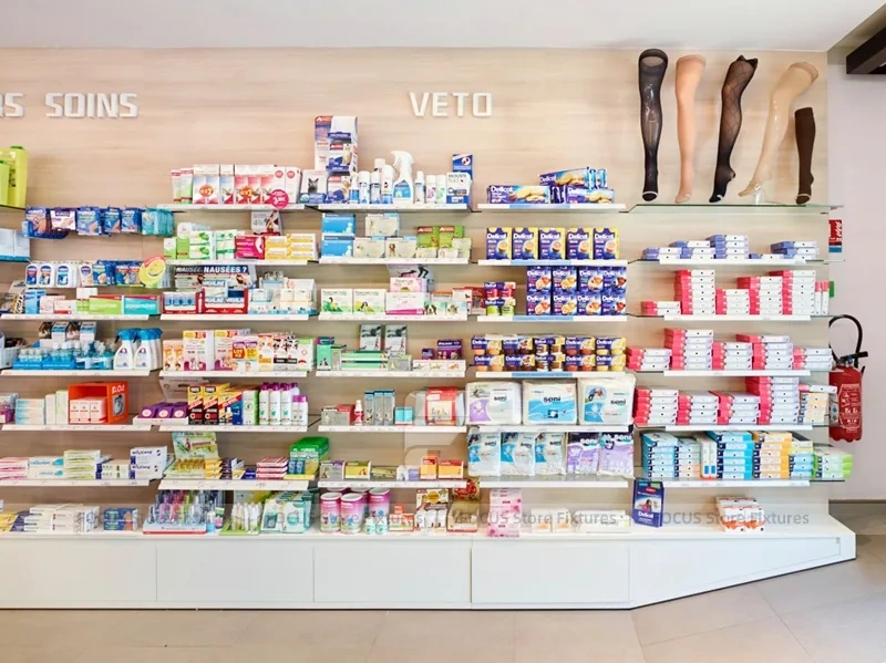 Minimal White Pharmacy Shelving with Red Accent Gondola