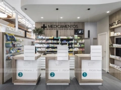 Night Facade Pharmacy Storefront with Wood Counter Interior
