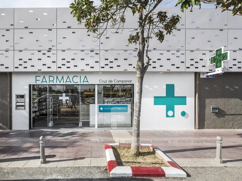 Night Facade Pharmacy Storefront with Wood Counter Interior