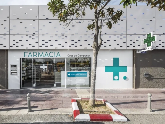 Night Facade Pharmacy Storefront with Wood Counter Interior
