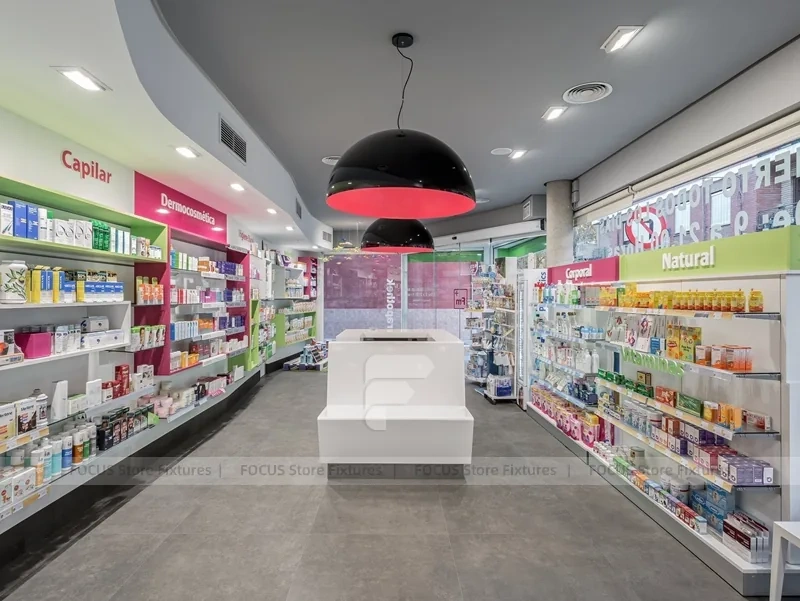 Pink Accent Pharmacy Checkout Counters and Wall Shelving