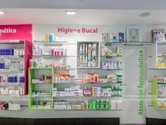 Pink Accent Pharmacy Checkout Counters and Wall Shelving