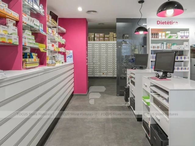 Pink Accent Pharmacy Checkout Counters and Wall Shelving