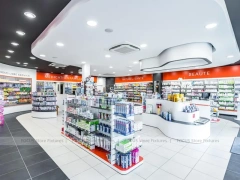 Red Accent Pharmacy Gondola and Curved Checkout Counter