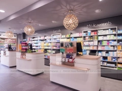 Soft Gray Pharmacy Counter with Wood Slat Wall Display