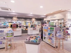 Soft Gray Pharmacy Counter with Wood Slat Wall Display