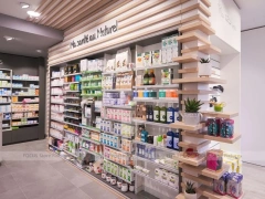 Soft Gray Pharmacy Counter with Wood Slat Wall Display