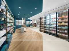 Teal Ceiling Pharmacy Wall Shelving and Counter Layout