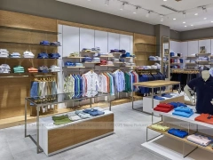 Warm Wood Menswear Wall and Glass Table Display