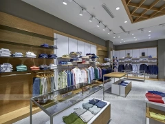 Warm Wood Menswear Wall and Glass Table Display