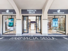 White Blue Pharmacy Interior with Central Column Display