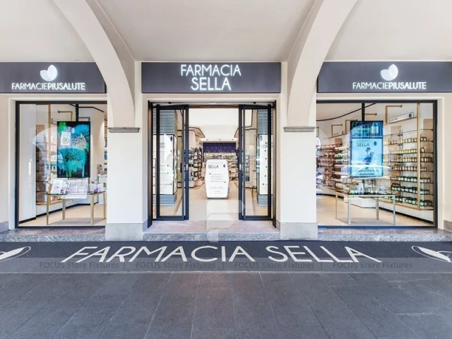 White Blue Pharmacy Interior with Central Column Display