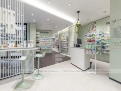 White Green Pharmacy Reception and Wall Shelving Layout