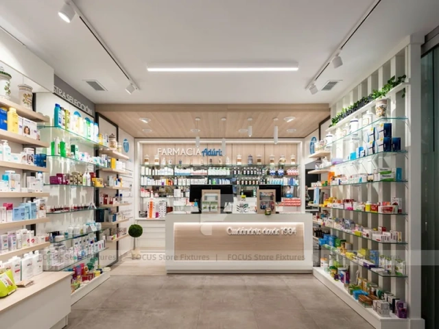White Linear Pharmacy Aisle Shelving and Back Counter