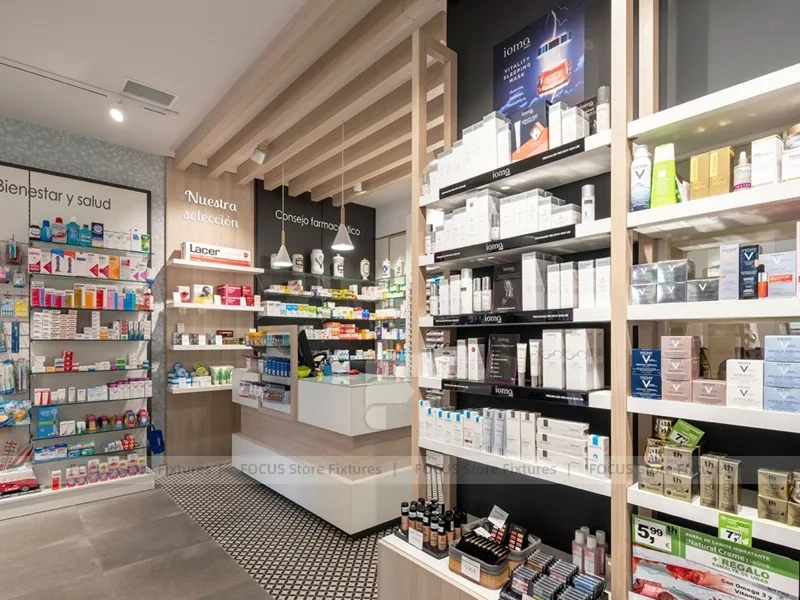 White Linear Pharmacy Aisle Shelving and Back Counter