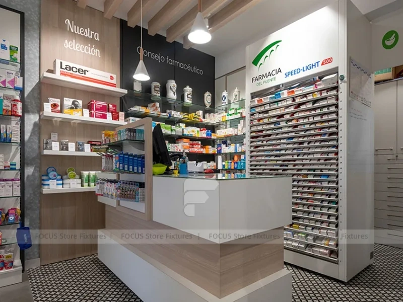 White Linear Pharmacy Aisle Shelving and Back Counter
