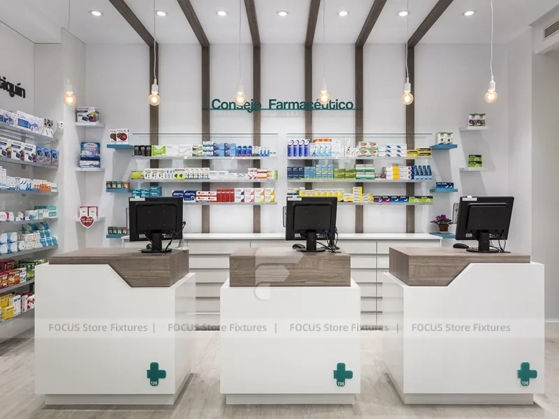 White Pharmacy Checkout Counter and Wall Shelving