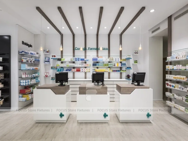 White Pharmacy Checkout Counter with Black Signage Wall