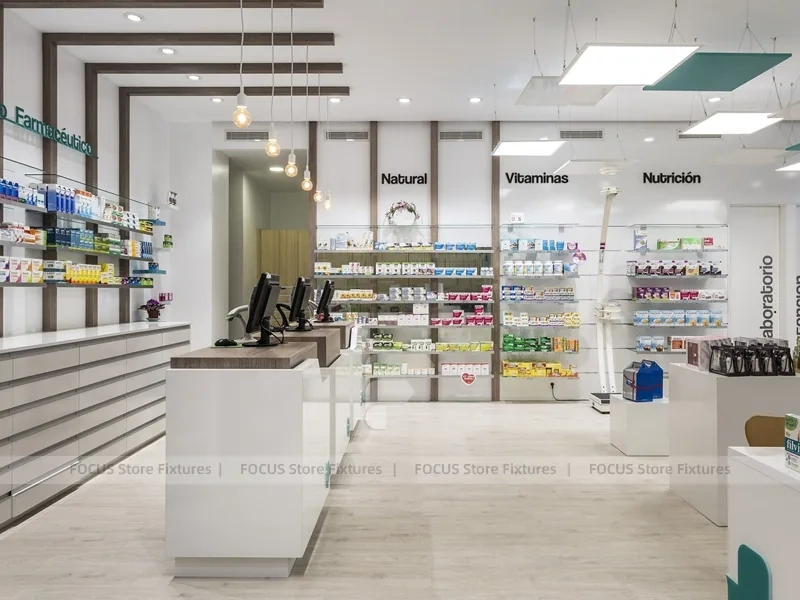 White Pharmacy Checkout Counter with Black Signage Wall