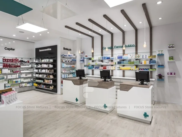 White Pharmacy Checkout Counter with Black Signage Wall