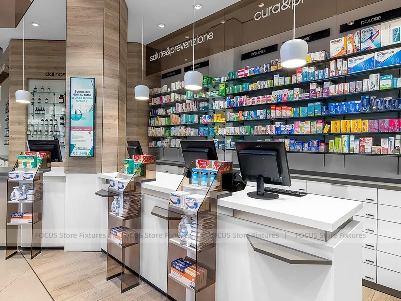 White Pharmacy Checkout Counter with Central Gondola Display