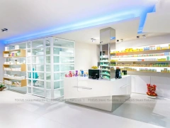 White Pharmacy Interior with Blue Lighting Accent