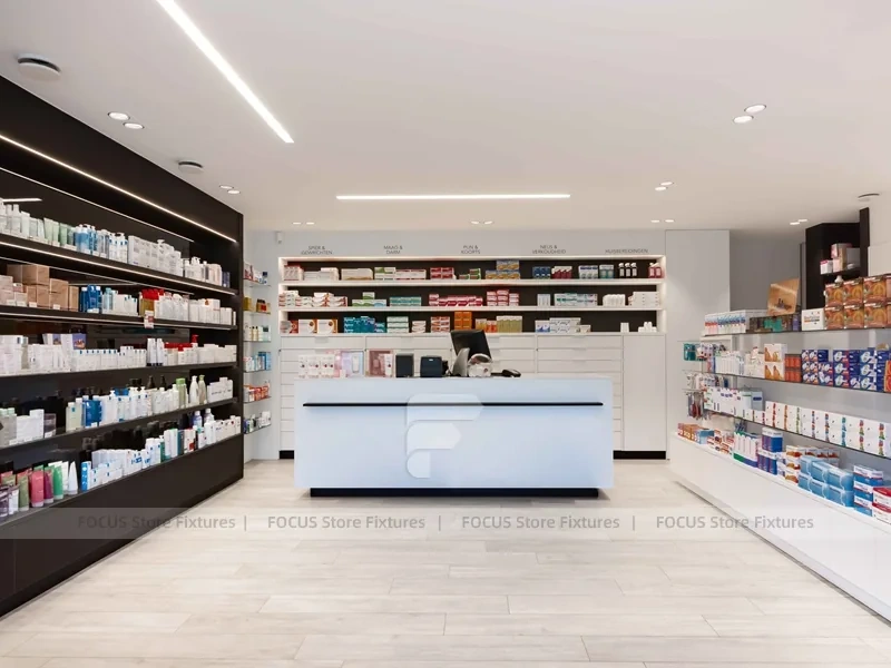 White Pharmacy Reception Counter with Dark Wall Shelves