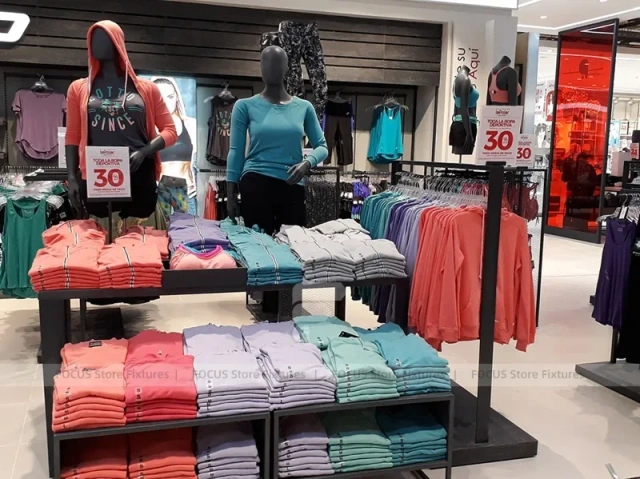 White Sportswear Mannequin Island and Wall Display