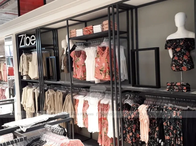 White Sportswear Mannequin Island and Wall Display