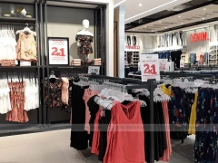 White Sportswear Mannequin Island and Wall Display