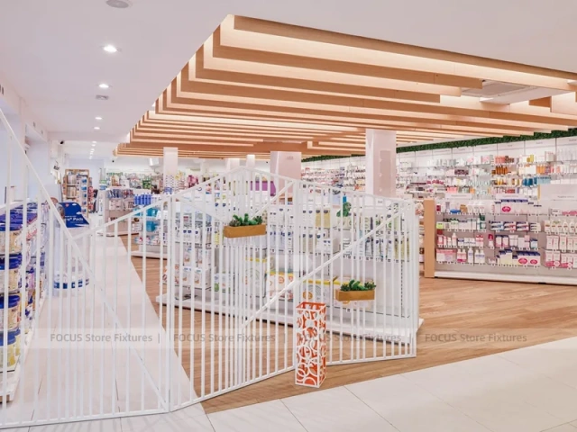 Wood Slat Ceiling Pharmacy Island Shelving Layout