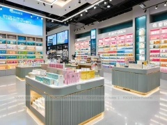 Gray Gold Cosmetics Store with Island Displays