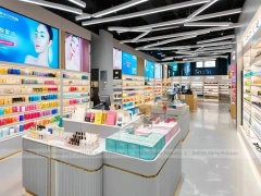 Gray Gold Cosmetics Store with Island Displays