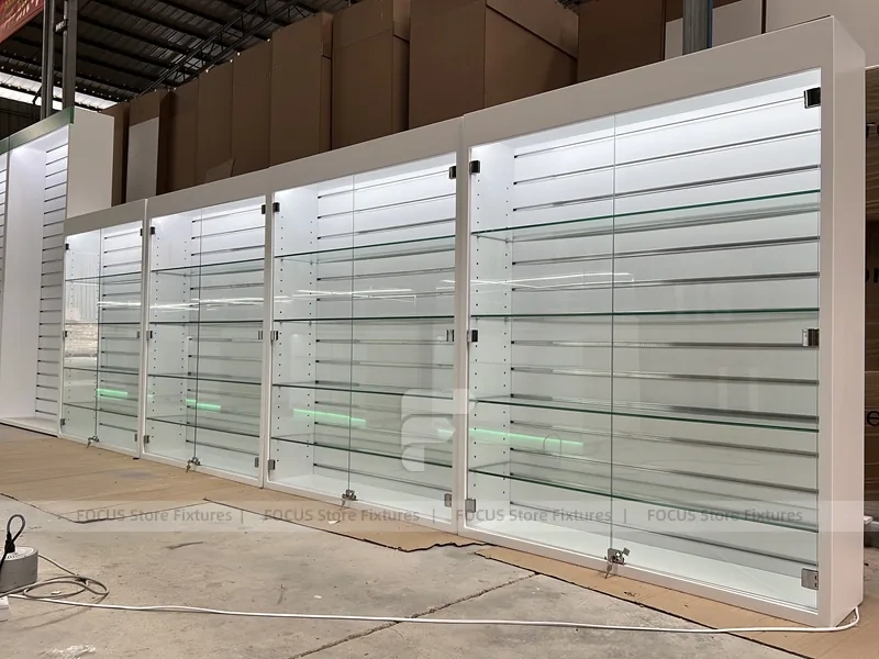 Long White Mobile Phone Counter With Green Lighting