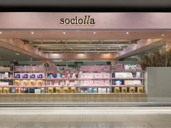 Pink Arched Cosmetics Boutique with Seating Area
